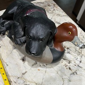 Big sky carvers “after practice” lab puppy with redhead duck Bradford Williams